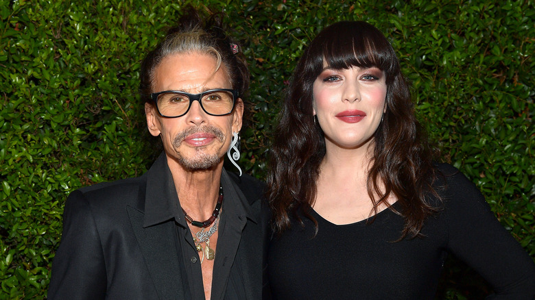Steven Tyler and daughter Liv Tyler posing