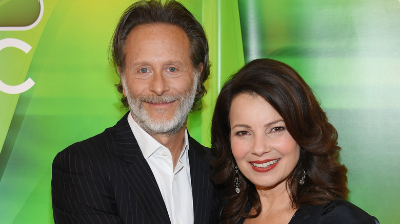 Steven Weber posing with Fran Drescher at an event