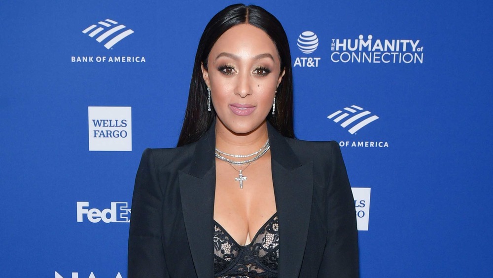 Tamera Mowry-Housley on a red carpet
