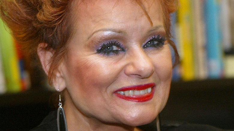 Tammy Faye Bakker smiling into the camera