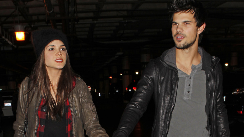Marie Avgeropoulos and Taylor Lautner