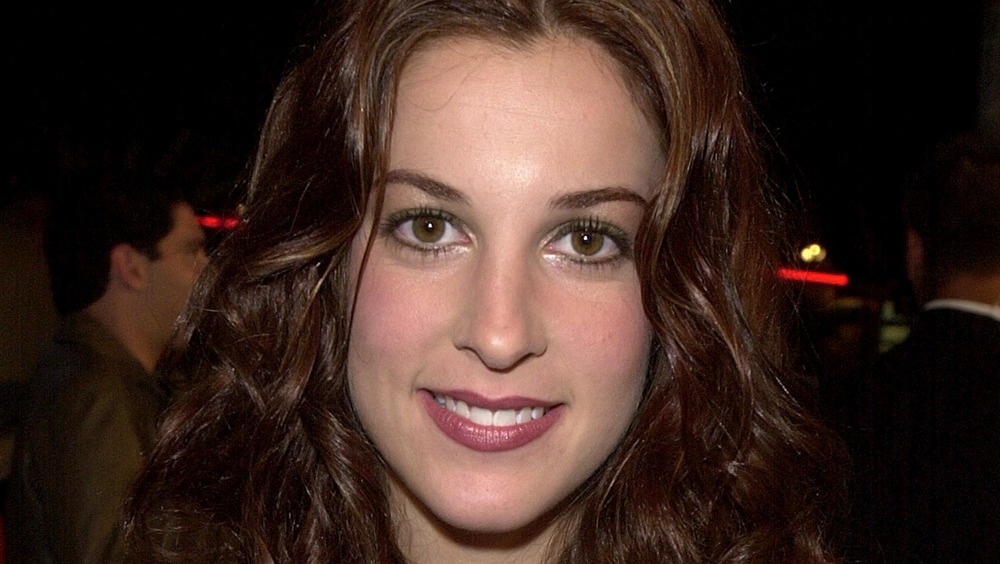 Lindsay Sloane smiling at an event in 2000