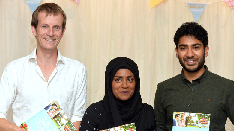 Ian Cumming, Nadiya Hussain, and Tamal Ray at book signing after the Great British Bake Off final at Waterstone's Piccadilly