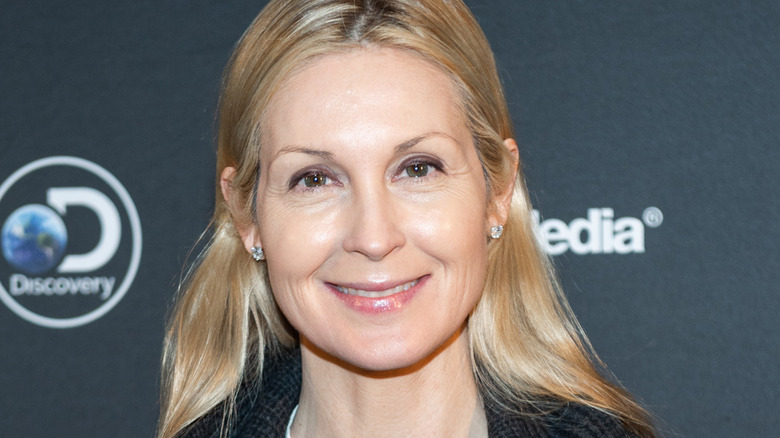 Kelly Rutherford at an event, smiling