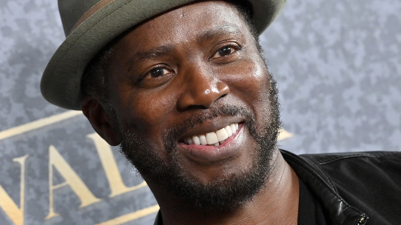 Harold Perrineau smiling on red carpet