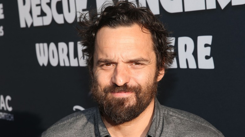 Jake Johnson smiling 