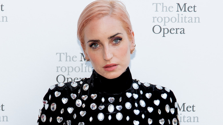 Zoe Lister-Jones posing