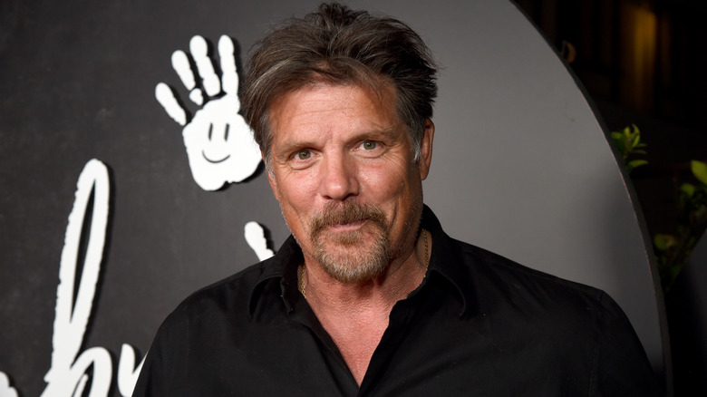 Paul Johansson smirking at event
