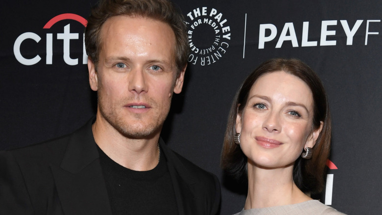 Sam Heughan and Caitriona Balfe attend the Outlander 10th Anniversary Celebration