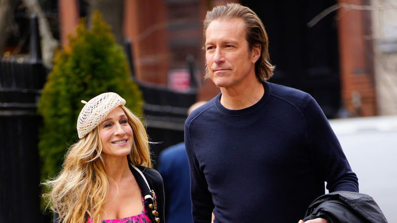 Carrie Bradshaw smiling at Aidan Shaw on "And Just Like That..."