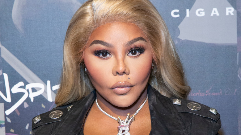 Lil' Kim posing