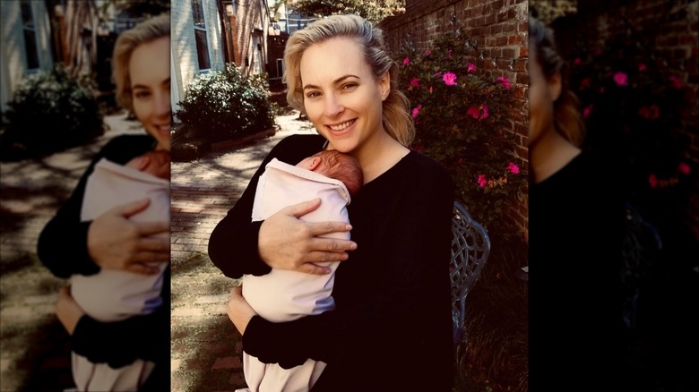 Meghan McCain wearing no makeup while holding her baby