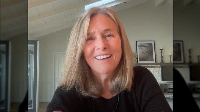 Makeup-free Meredith Vieira speaking during a podcast recording