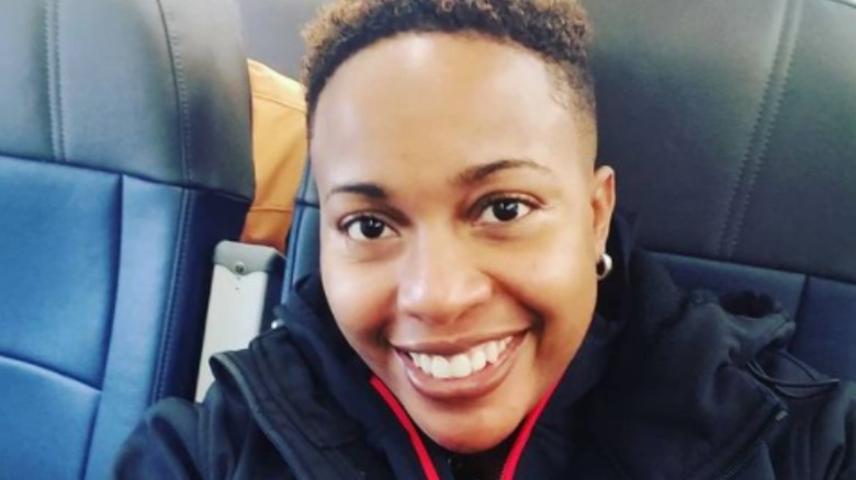 La Tasha McCutchen smiling in chair