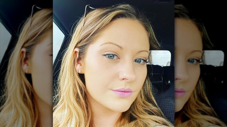 Meghan Gill inside vehicle