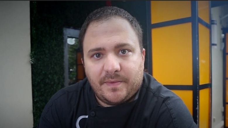 Paul Niedermann speaking outdoors