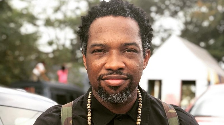 Rahman Rock Harper smiling outdoors