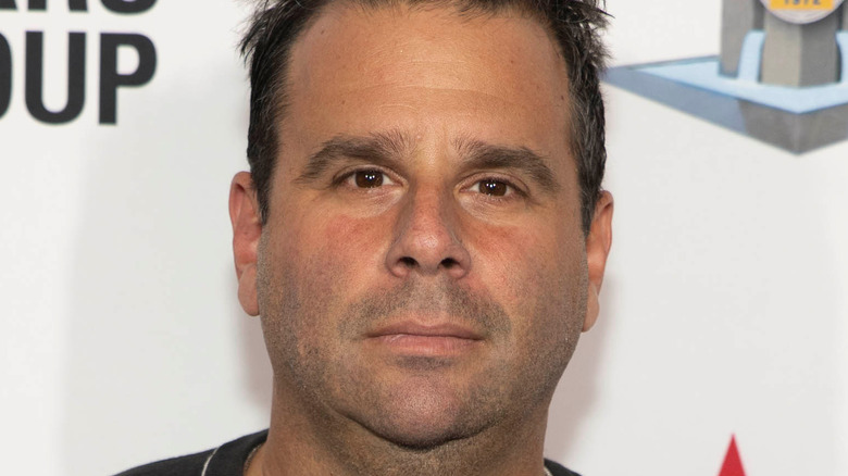 Randall Emmett posing at event