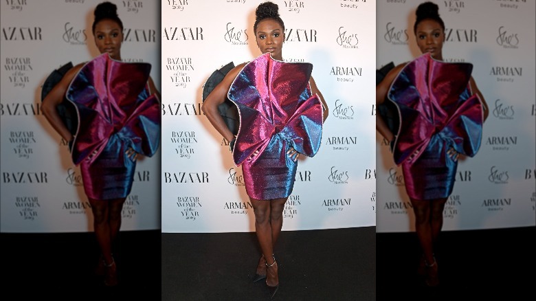 Dina Asher-Smith in a pink dress