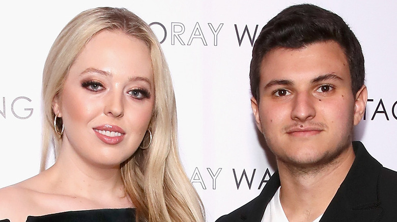 Tiffany Trump and Michael Boulos posing