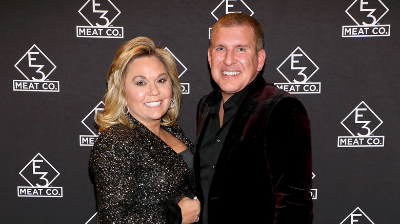 Todd and Julie Chrisley attending opening event