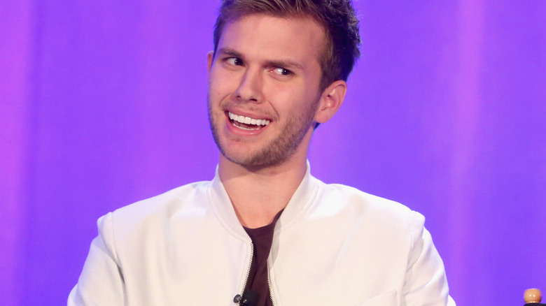 Chase Chrisley speaks onstage during a panel
