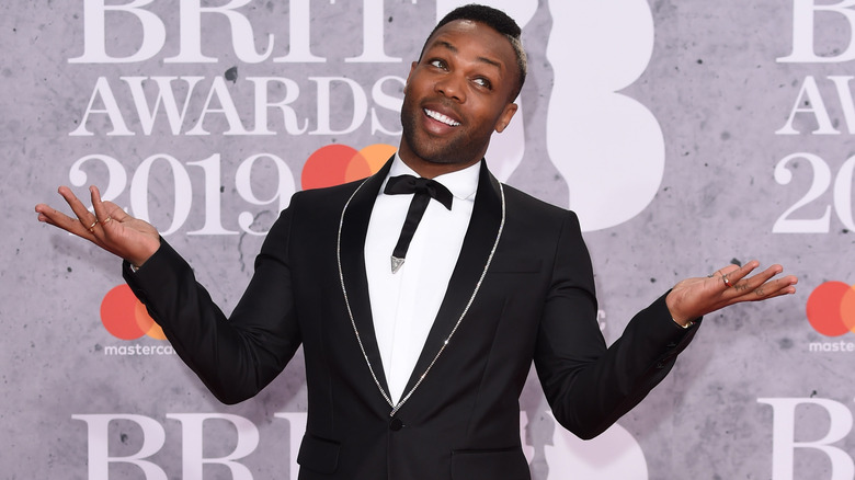 Todrick Hall shrugs animatedly