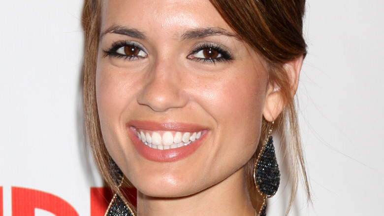 Torrey DeVitto smiling