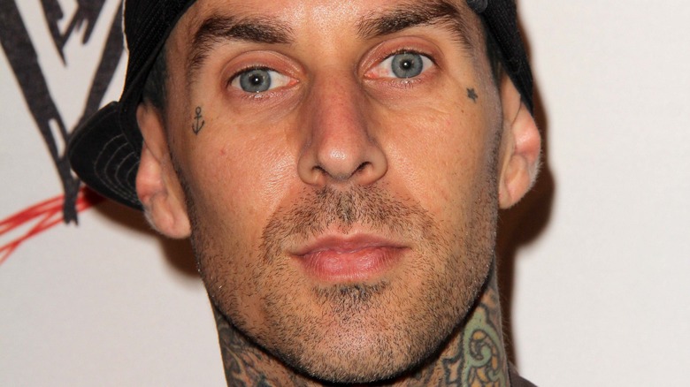 Travis Barker sports a 5 o'clock shadow