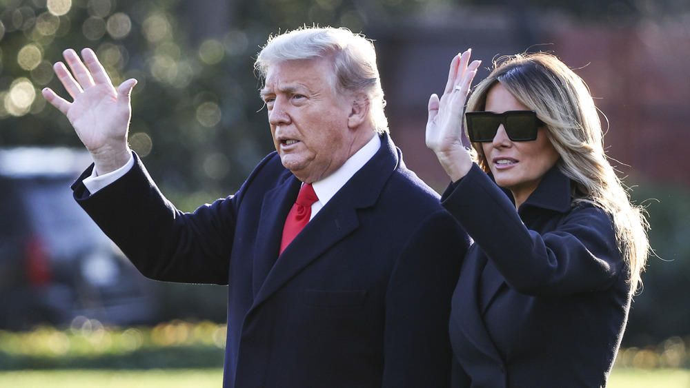 Donald Trump and Melania Trump waving