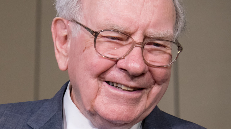 Warren Buffett laughing