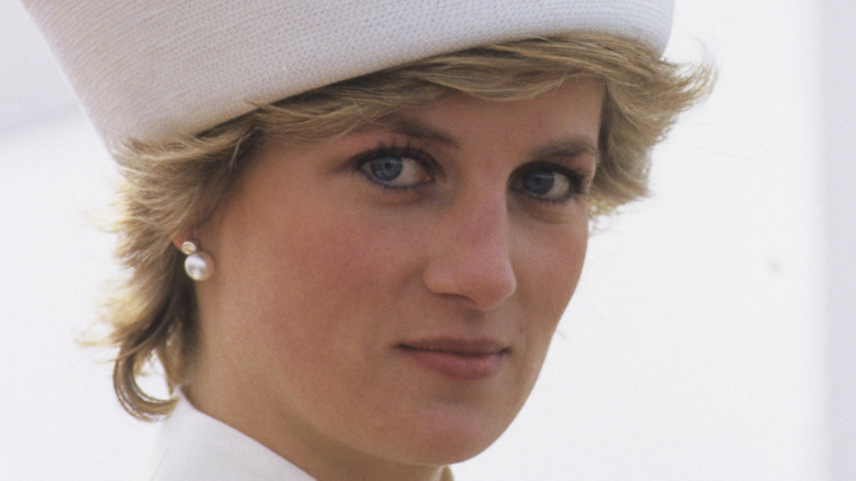 Princess Diana in a white hat