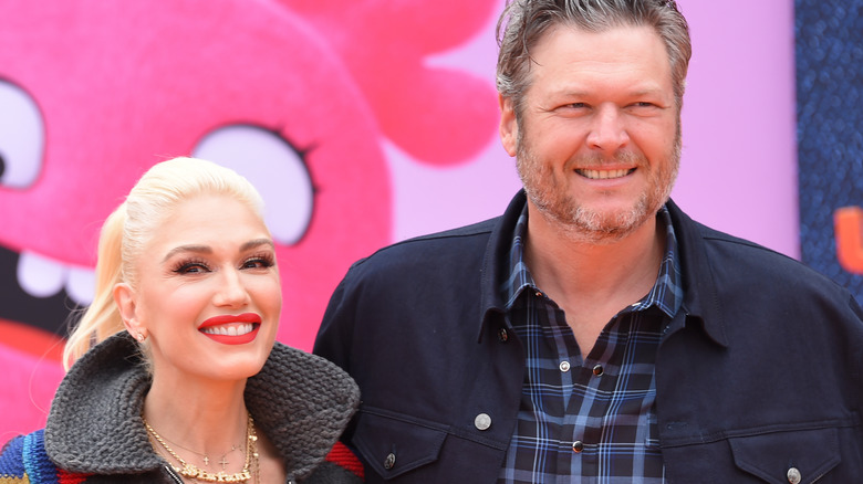 Gwen Stefani and Blake Shelton smiling in 2019 