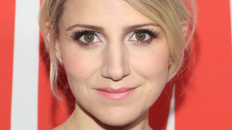 Annaleigh Ashford smiling in pink lipstick 