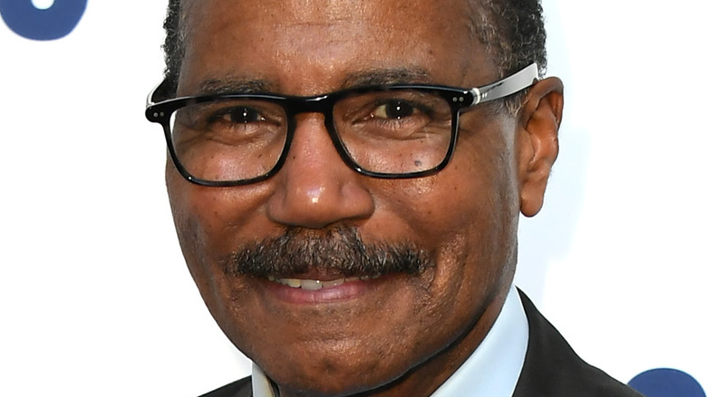 Bill Whitaker smiles on the red carpet