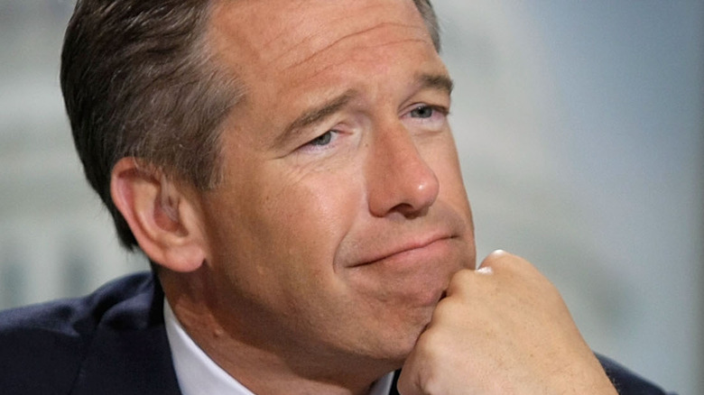 Brian Williams in the same pose as Rodin's "Thinker"