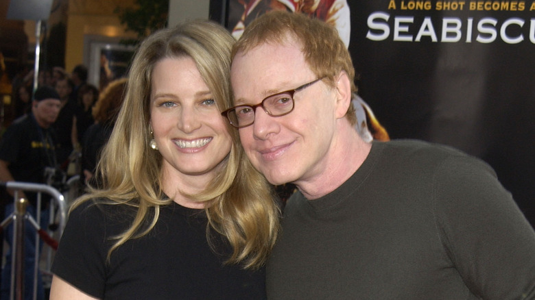 Bridget Fonda stands beside Danny Elfman