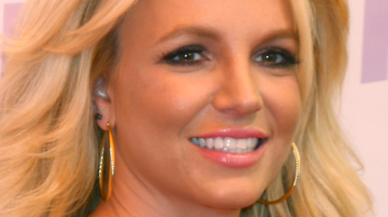 Britney Spears with gold hoops