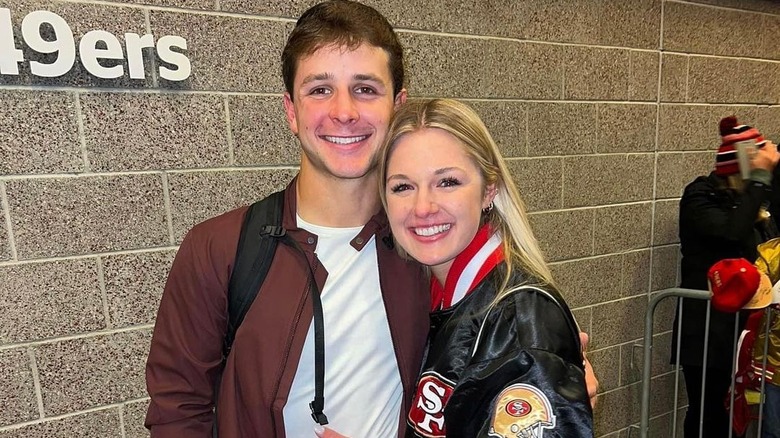Jenna Brandt posing with Brock Purdy