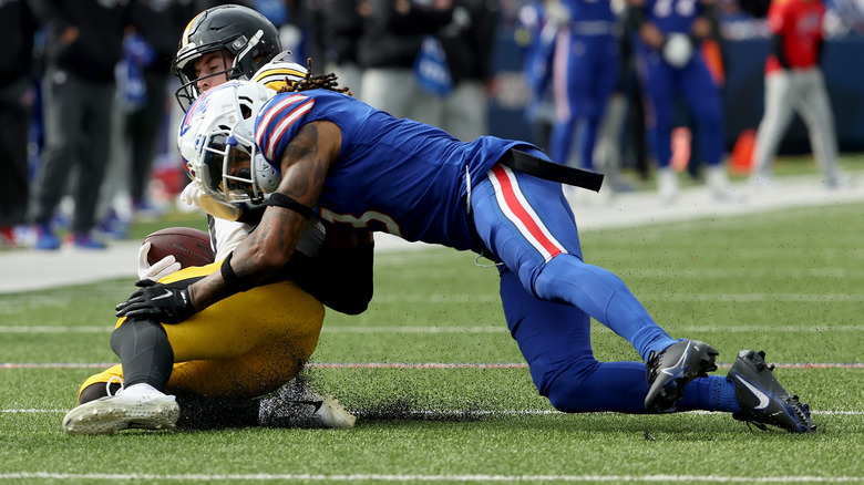 Damar Hamlin tackles Kenny Pickett on the field