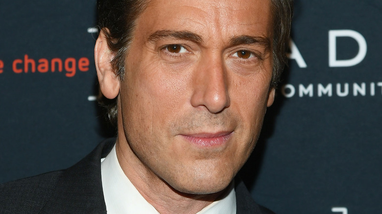 David Muir posing