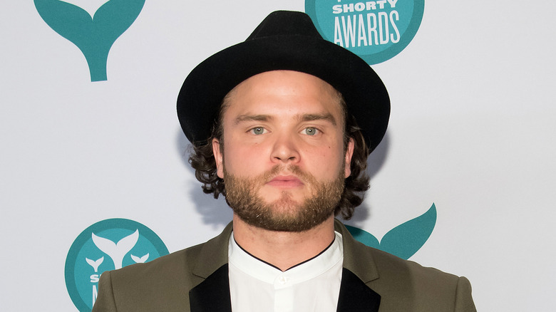 J. Cyrus wearing hat