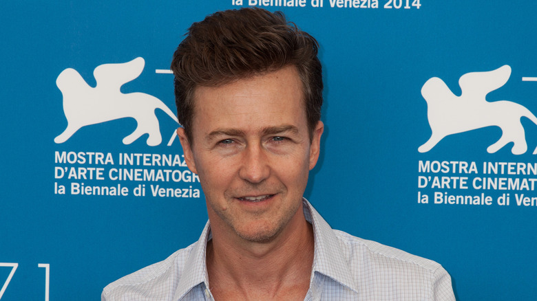 Edward Norton wearing a white shirt