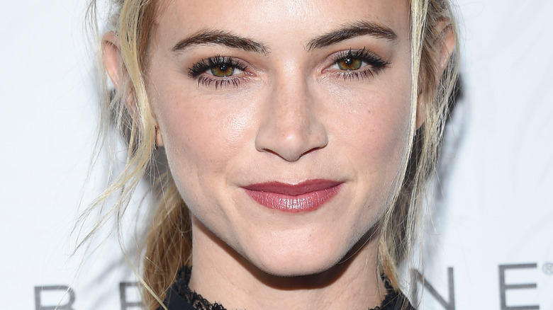 Emily Wickersham with slight smile