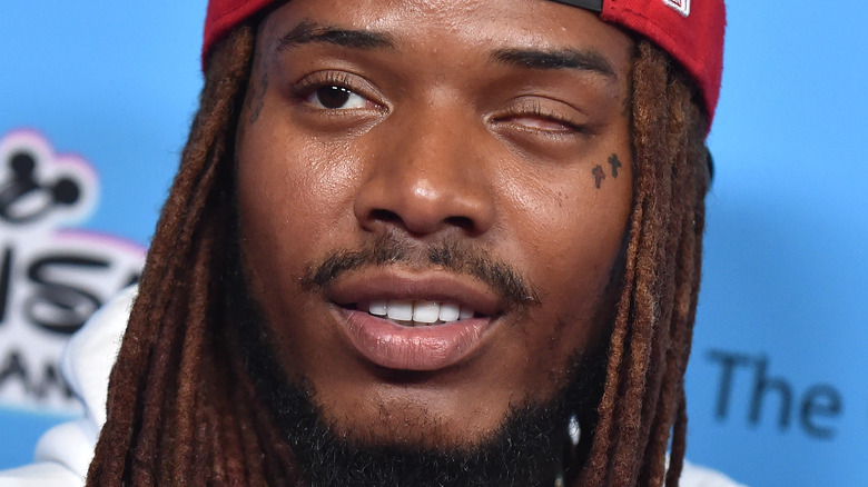 Fetty Wap wearing backward cap