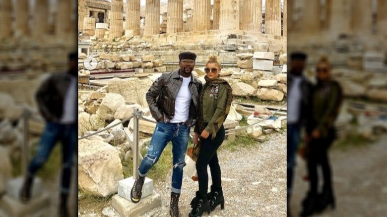 Floyd Mayweather and Anna Monroe pose in front of Greek Parthenon
