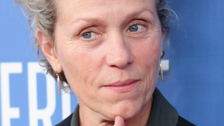 Frances McDormand poses with finger on chin