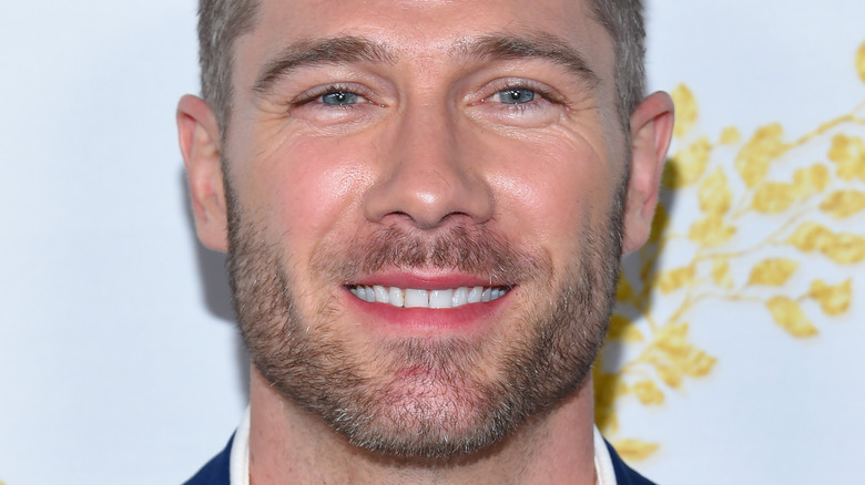 Luke Macfarlane smiling