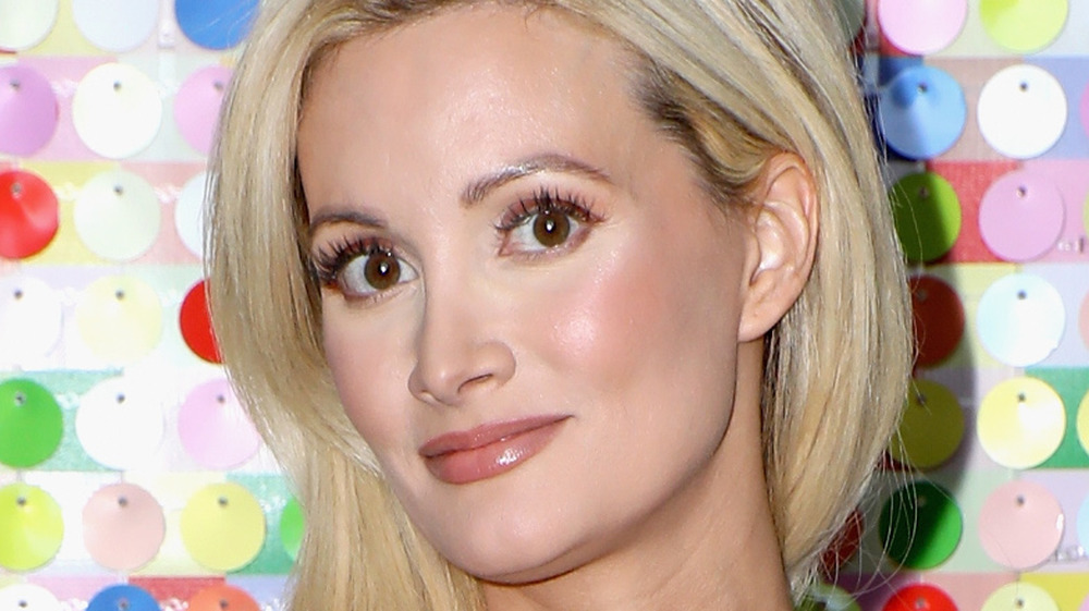 Holly Madison with a neutral expression