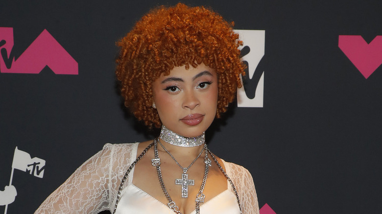 Ice Spice wearing diamond cross